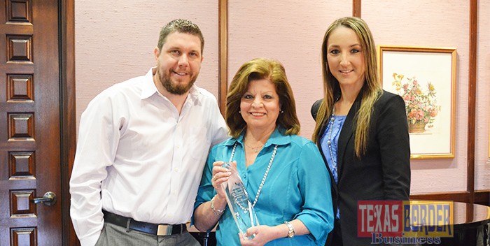 IBC Bank-McAllen Senior Vice President of Marketing Dora Brown was honored with the Leadership McAllen Alex Longoria Leadership Award for her dedication and commitment to the quality of life in McAllen. Brown accepted the award from Leadership McAllen President Dirk Westphal and incoming President Maria Elena Gonzalez at the organization’s recent graduation banquet. EndFragment 
