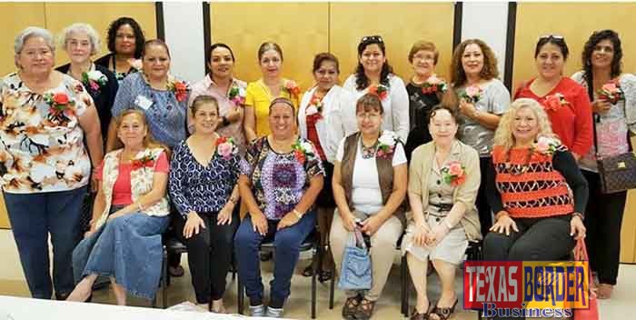 Photo caption: Our Latina Hope program women showcasing their work after creating a rose pin through the Latina Hope workshops.