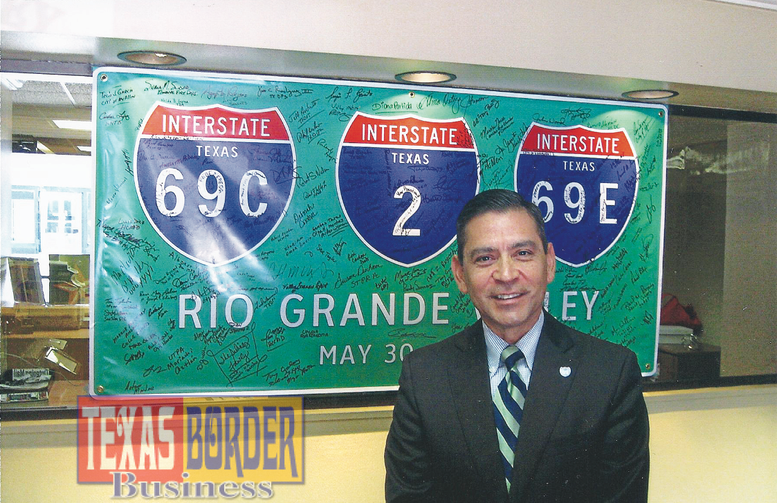 Julian Alvarez, President/CEO of the Rio Grande Valley Partnership. Interstate Highway I-69 signs going up on Valley highways.
