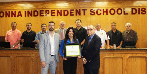Pictured in front of the Donna ISD School Board Members is ERO Architects’ André F. de Mattos, LEED AP BD+C, Lydia Gonzalez, Donna 3-D Academy principal, and ERO Architects Chief Financial Officer Manuel Hinojosa, FAIA, as they hold the certificate that signifies the LEED certification