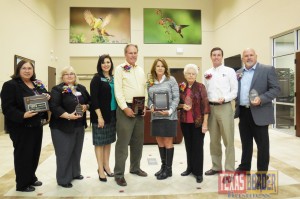 Pictured L-R: Immediate Past Chair Bertha Suarez, Volunteer of the Year Sheila Shidler, Chamber Board Chair Norma Montalvo, Man of the Year Jeff Walker, Woman of the Year Rhonda Garza, Citizen of the Year Mary Mattar, Board Member of the Year Brian Humphreys, and Gerry Bower, TLC Total Lawn Care, Business of the Year.