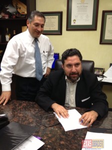 Sergio Sanchez seating, with him Javier Villalobos current Republican chairman in Hidalgo County.