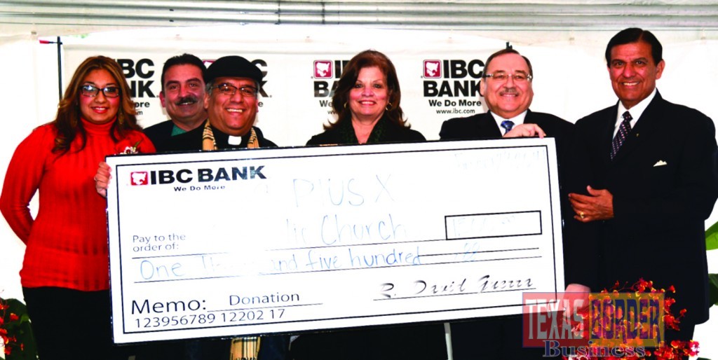 IBC Bank donates $1,500.00 to St. Pius X Catholic Church in Weslaco. Mr. David Guerra President CEO of the bank and Texas State Senator Eddie Lucio, Jr.; Dora Brown VP of Marketing for the bank  and representatives from the church hold the check.