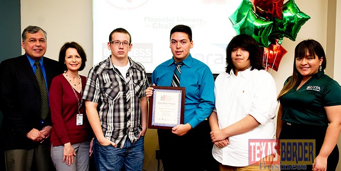 A team from Harlingen High School South won first place in the Stock Market Game, an Internet-based investment simulation and competition sponsored last fall by The University of Texas-Pan American’s Financial Literacy Challenge (FLC). The team was recognized at a recent awards ceremony held at the UTPA College of Business Administration. Pictured left to right are Dr. Alberto Davila, chair, UTPA Department of Economics and Finance; Suzanne Reagan, teacher, Harlingen High School South; winning team members William Nacey, Eric Garcia, and Esteban Rangel; and Edna Pulido, FLC program assistant and economics and finance major at UTPA.