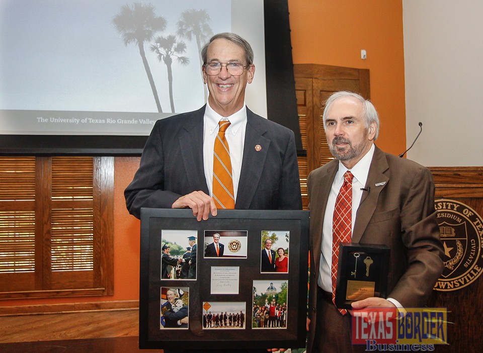 UT Brownsville President Dr. William Fannin stands with UTRGV President Dr. Guy Bailey after presenting gifts to each other during a meeting at the Brownsville campus on Tuesday, August 11, 2015 at El Gran Salon. Jennifer Wiley / UT Brownsville
