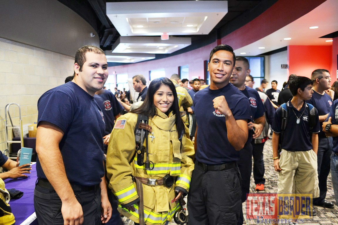 Fire Academy: A potential South Texas College Fire Academy student tries on firefighting gear during the 2014 Public Safety & First Responders Expo at the Cooper Center.