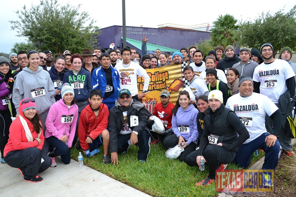 Turkey Trot 1: Race participants from the community gathered at the Cooper Center at the end of a previous Turkey Trot to celebrate a successful event.