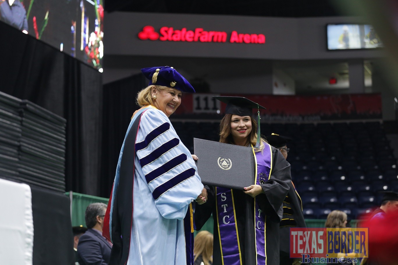 STC President Dr. Shirley A. Reed awards a diploma to a Bachelor Program student during the first commencement ceremony on Saturday, December 12. Photo by South Texas College - Ben Briones
