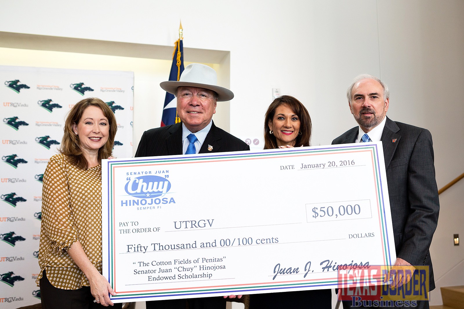 Sen. Juan ‘Chuy’ Hinojosa (wearing his trademark hat) on Wednesday, Jan. 20, 2016, presented a check for $50,000 to UTRGV President Guy Bailey (at right), during a press conference at the Performing Arts Center on the UTRGV Edinburg Campus. Also shown here are Dr. Kelly Cronin, UTRGV vice president for Advancement (at left) and Veronica Gonzales, UTRGV vice president for Government and Community Relations. The gift will fund scholarships and supports the already established ‘The Cotton Fields of Peñitas’ Senator Juan ‘Chuy’ Hinojosa Endowed Scholarship.’ (UTRGV Photo by Paul Chouy)