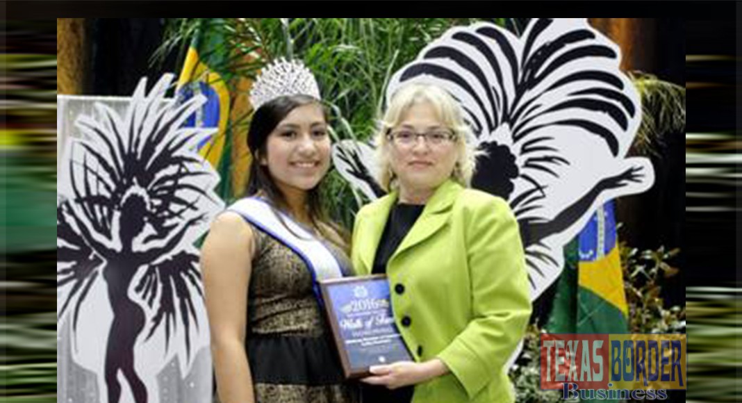 Pictured is above is Letty Gonzalez (Right) receiving her inductee plaque from a representative of Miss Hidalgo Queens Royal Court. Edinburg Chamber of Commerce President Letty Gonzalez was inducted into the Rio Grande Valley Walk of Fame March 3rd at the City of Hidalgo's 2016 BorderFest. She was nominated for the honor by the Edinburg Chamber of Commerce.