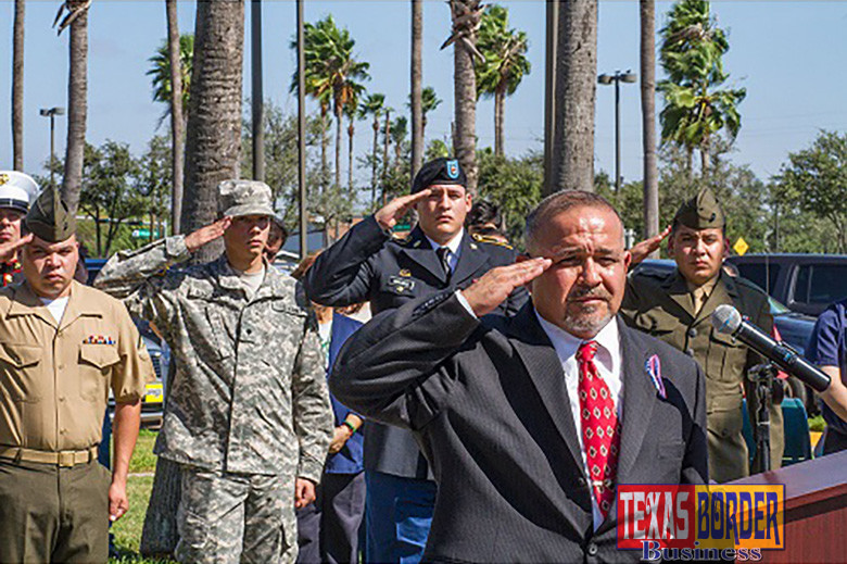 Javier Arredondo, Veterans Coordinator at South Texas College, salutes veterans at STC's 2015 Veterans Day Ceremony.