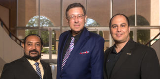 The UTRGV College of Engineering and Computer Science has received a grant from the Greater Brownsville Inceptives Corporation to lead the Manufacturing Innovations Hub (MIH) in Brownsville. Leading the project are, from left, Dr. Immanuel Edinbarough, interim associate dean for External Affairs and Innovation; Dr. Alexander Domijan, dean of the College of Engineering and Computer Science; and Dr. Constantine Tarawneh, director of the University of Transportation Center for Railway Safety and associate dean for Research. (UTRGV Photo by David Pike)