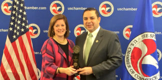Suzanne Clark, Senior Executive Vice President of the U.S. Chamber of Commerce, presenting the Spirit of Enterprise award to Congressman Cuellar