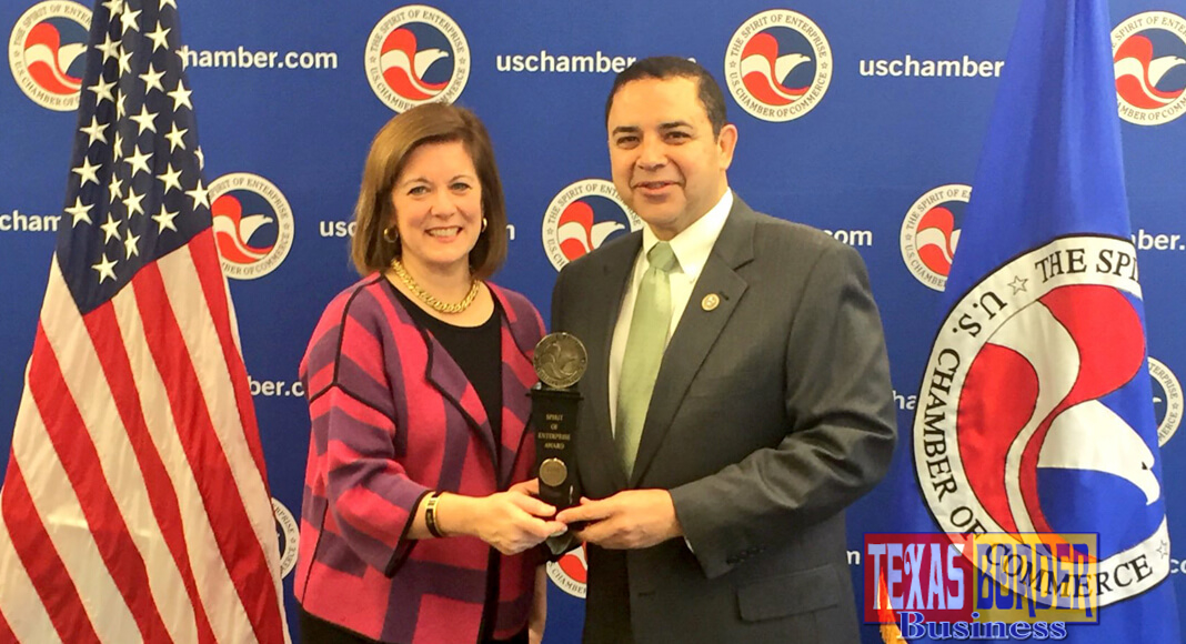 Suzanne Clark, Senior Executive Vice President of the U.S. Chamber of Commerce, presenting the Spirit of Enterprise award to Congressman Cuellar