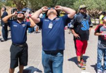 Members of The University of Texas Rio Grande Valley community gathered on the Edinburg Campus on Monday, Aug. 21, 2017, along with families with small children, Boy Scouts, soccer players and others, to watch the historic total solar eclipse. The total eclipse is when the New Moon passes between the Earth and the Sun and casts its shadow on Earth, appearing to block out the sun. In Edinburg, only about 50 percent of the sun was blocked out at its peak hour, with totality experienced in other parts of the country. (UTRGV Photo by David Pike)