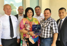 Shown with the Medium Chamber of the Year Award are left to right in the front row: Brent Smith, Chair; Cynthia M. Sakulenzki, Pres/CEO; John Gonzalez, Treasurer and Nathan Obregon, chair-elect.  Back row left to right are:  Ernesto Obregon, vice chair of finance, Alex Martinez, vice chair of government affairs; Ronnie Bernal, past-chair and Michael Sandoval, vice chair of Education.