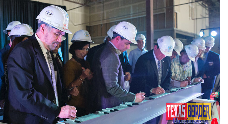 Weslaco and UTRGV leaders gather for beam signing ceremony