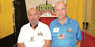 Pictured from L-R: Silver Treviño the creator or Ready Tee as he participates in the McAllen Chamber of commerce Business Expo. With him Mahdi Shaheen, Ready Tee representative.