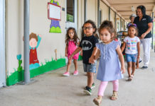 Young children walk hand in hand back to their classrooms after recess at STC's child development center located near the Mid-Valley Campus in Weslaco.  The Department of Childhood Development at South Texas College (STC) received a four year grant from the U.S Department of Education of $929,800 as part of the Child Care Access Means Parents in School Program.