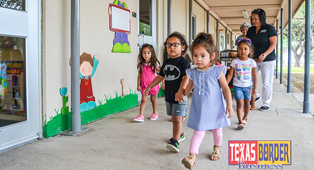 Young children walk hand in hand back to their classrooms after recess at STC's child development center located near the Mid-Valley Campus in Weslaco.  The Department of Childhood Development at South Texas College (STC) received a four year grant from the U.S Department of Education of $929,800 as part of the Child Care Access Means Parents in School Program.