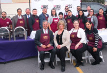 Pictured above, IBC Bank staff. They participated in an activity that fed close to 400 homeless or strange people in the Valley. The event took place in parking lot across from Sacred heart and designated to be used as the space for a future building of the Humanitarian Respite Center. Adrian Villarreal president and CEO of IBC Bank headed the effort. Photos by Roberto Hugo Gonzalez