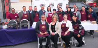 Pictured above, IBC Bank staff. They participated in an activity that fed close to 400 homeless or strange people in the Valley. The event took place in parking lot across from Sacred heart and designated to be used as the space for a future building of the Humanitarian Respite Center. Adrian Villarreal president and CEO of IBC Bank headed the effort. Photos by Roberto Hugo Gonzalez