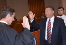 Pictured above, the Honorable Randy Crane. U.S. District Court Judge, Southern District of Texas, takes Javier Villalobos’ oath of office and officially becomes McAllen City commissioner.