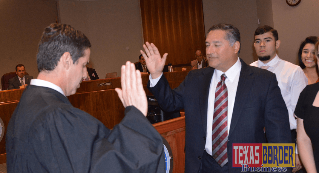 Pictured above, the Honorable Randy Crane. U.S. District Court Judge, Southern District of Texas, takes Javier Villalobos’ oath of office and officially becomes McAllen City commissioner.