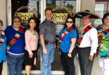 Shown making plans for the “Compadre Raid” are Compadres left to right:  Toni Williams, Nilda Paxman, Gina Cruz, Alvie Britton, Cowboy Chicken owner; Jennifer Vasquez, Augie Lozano and Cynthia M. Sakulenzki, RGVHCC Pres/CEO.