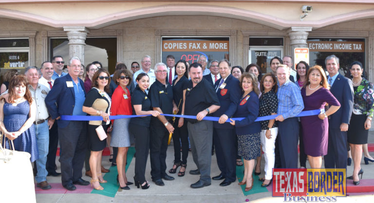 McAllen Chamber of Commerce cuts the ribbon at Advertir’s 40th anniversary reception. In the center in black polos are the staff, from left Vanessa Robledo, office manager, Christopher Julian, President, Gladys Rodriguez, sales assistant & Ralph De Anda, V.P