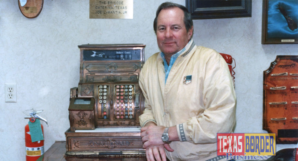 Joe LaMantia, Jr. next to an antique cash register. If was his preference for this picture to be taken next to the cash register. Photo taken on July 1988 and published in Texas Border Digest August 1988. Photo by Roberto Hugo González.