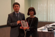 Dr. Myoung-Hwan Kim, UTRGV assistant professor of physics, was named Outstanding Young Researcher for 2018 by The Association of Korean Physicists in America, at the annual meeting of the American Physical Society. Here, he is seen accepting his award from AKPA President Young-Kee Kim at the KPS-AKPA Symposium in March at the Los Angeles Convention Center. (Courtesy Photo)