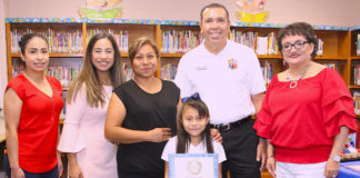 Monte Cristo Elementary School student Crystal Pacheco displays her Student Heroes Award during a special ceremony in the school’s library. Pictured (L-R): Ruth Espiricueta, Monte Cristo ES teacher, Marisa Perez-Diaz, member of the State Board of Education, District 3; Maria Cortez, Crystal’s mother; Crystal Pacheco, first-grade student; Dr. René Gutiérrez, Edinburg CISD superintendent; and Diana Cervantes-Smith, Monte Cristo ES principal.