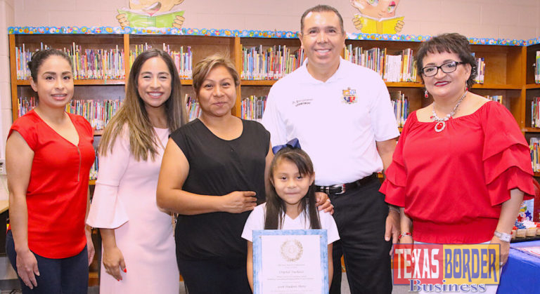 Monte Cristo Elementary School student Crystal Pacheco displays her Student Heroes Award during a special ceremony in the school’s library. Pictured (L-R): Ruth Espiricueta, Monte Cristo ES teacher, Marisa Perez-Diaz, member of the State Board of Education, District 3; Maria Cortez, Crystal’s mother; Crystal Pacheco, first-grade student; Dr. René Gutiérrez, Edinburg CISD superintendent; and Diana Cervantes-Smith, Monte Cristo ES principal.