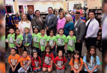 Cynthia Rodriguez, principal, Sanchez Elementary School; McAllen Chief of Police Victor Rodriguez; City of McAllen Dist. 2 Commissioner Joaquin “J.J.” Zamora; Dr. J. A. Gonzalez, McAllen I.S.D. Superintendent; Alexandra Molina, McAllen I.S.D. Child Nutrition Services Director; Kate Horan, McAllen Public Library Director; Conrado Alvarado, McAllen I.S.D. School Board Member; and Jacob Martinez, McAllen I.S.D. transportation director, pose with students of Sanchez Elementary School after today’s Mcallen Summer Feeding program was announced.  There are 57 sites, including schools, libraries, parks, police substations, community centers, religious facilities and youth organizations sites and 15 bus routes that will provide meals to anyone in McAllen throughout the summer, beginning June 4.  To find summer feeding locations, go to the McAllen ISD website (mcallenisd.org) or City of McAllen website (mcallen.net). You can also dial a state hotline number (2-1-1) to get locations near you. Or, send a text. Type the word “Foodtx” and send to 877-877. #mcallensummerfeeding2018