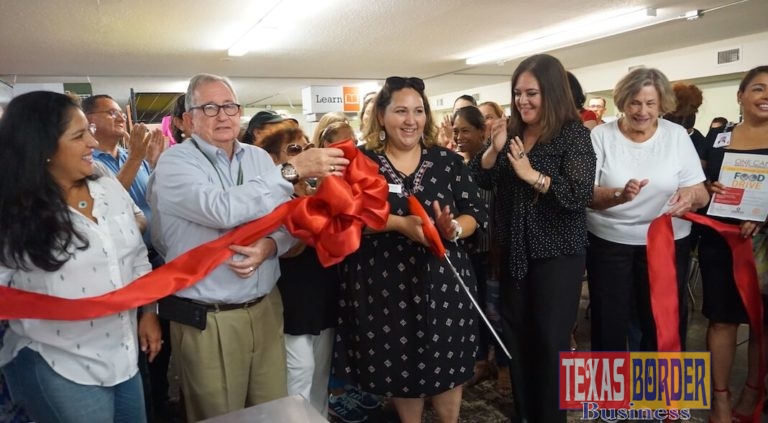 Pictured:  Lory Chavez (center), Community Food Project Manager, cuts the ribbon at the Mesa Llena grand opening, with Jack White, Good Neighbor Settlement House Executive Director, and DeAnne Economedes, Food Bank RGV Interim-CEO & COO.  The Mesa Llena community food project has opened at the Good Neighbor Settlement House, located at 1216 E. Tyler, Brownsville. The project will serve as a client-choice emergency food pantry, demo kitchen, learning center and incorporate other community partners. Volunteers are needed Tuesday through Friday, 9 am to 5 pm.  For more information, contact Carla Lopez, (956) 682-8101 or visit: www.foodbankrgv.com.