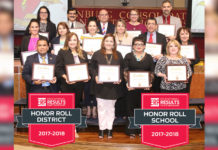 16 Edinburg CISD school principals pose for a photo during the May 22 Board Meeting for achieving Texas Honor Roll School distinctions. ECISD was also selected as a Texas Honor Roll District.