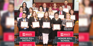 16 Edinburg CISD school principals pose for a photo during the May 22 Board Meeting for achieving Texas Honor Roll School distinctions. ECISD was also selected as a Texas Honor Roll District.
