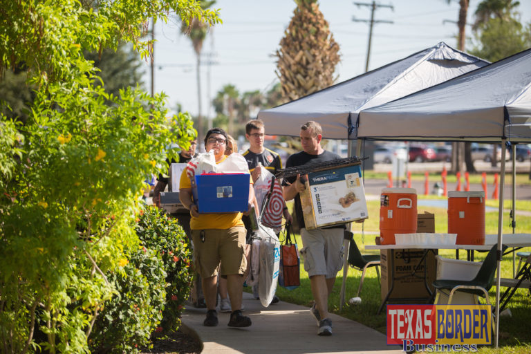 A week before the first day of class, university freshmen and their families set about moving into the dormitories at University of Texas Rio Grande Valley campuses this week, as the new school year gears up. Vaquero Move-In Days are Aug. 23–25 in Brownsville and Edinburg. Sergio Martinez, director of residential life, said about 900 students are moving into university housing this semester. (UTRGV Photo by Silver Salas)