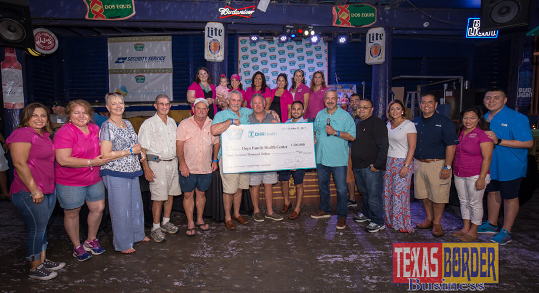 Pictured Above: DHR Health presents the Hope Family Health Center with a check for $300,000 at the 12th Annual “Fishing for Hope” Tournament in 2017.
