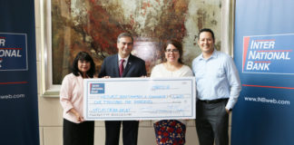 Inter National Bank presented the Weslaco Chamber of Commerce with a donation towards their annual Casino Night fundraiser. Pictured L-R: Oralia Tafolla, Vice President, SBA Lending Associate; Samuel J. Munafo, Inter National Bank, President & CEO; Laura Espinoza, Marketing Director, Weslaco Chamber of Commerce and Eric Rodriguez, Inter National Bank, Vice President, Senior IT Project Manager.