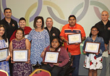 Edinburg Rotary recognizes ECISD Special Olympics Program Edinburg CISD Special Olympic athletes, coaches and administrators pose for a photo during an Edinburg Rotary meeting at the Echo Hotel in Edinburg.