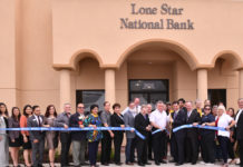 Lone Star National Bank opens New Branch on Buddy Owens and Ware Rd. Pictured, Alonzo Cantu, Charmain of Lone Star National Bank; McAllen Mayor Jim Darling and David Deanda, LSNB president. They were accompanied by dozens of guests to celebrate this event. Lone Star National Bank is located at 3605 Buddy Owens Blvd. Photo by Roberto Hugo Gonzalez