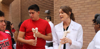 UTRGV medical student Lauren Muenchow shows a model of a human bone to high school students during a health professions fair, held at the UTRGV School of Medicine during HESTEC Week 2018. More than 1,000 middle and high school students visited the School of Medicine’s Medical Education Building to learn more about career opportunities in the health professions. (UTRGV Photo)