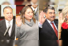 Four Edinburg Consolidated Independent School District board members are sworn in during a Special Called Board Meeting in the ECISD board room in Edinburg. Pictured L-R: ECISD School Board Member Xavier Salinas, ECISD School Board Member Leticia Garcia, ECISD School Board Member Oscar Salinas and ECISD School Board Member Dominga Vela.