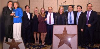 Pictured in the far right are Don Pancho Ochoa and his wife Flérida holding one of the trophies given to Don Pancho. Also, below them, the star that will be placed permanently at the Walk of Stars in Las Vegas, Nevada. Photo by Roberto Hugo Gonzalez. The star below them is a courtesy photo. Pictured to the left: from L-R: Jose, Flery, Lizeth, Don Pancho Ochoa and his wife Flérida, Carlos, Jose Francisco, and Omar Ochoa. This is the Ochoa family.