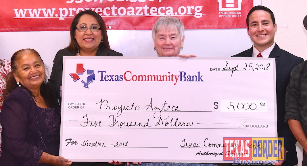 Pictured from L-R: Holding the check is one of the volunteers for Proyecto Azteca; Connie Gonzalez, Branch Operation Manager at TCB; Ann Williams Cass, Executive Director for Proyecto Azteca and Jonathan Coody, Commercial Lender at TCB.