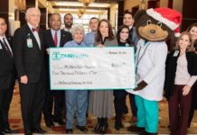 DHR Health presents a $5,000 donation to McAllen Police Chief Victor Rodriguez and the McAllen Police Department for the 17th Annual McAllen Police Department “Christmas for Kids” Toy Drive.