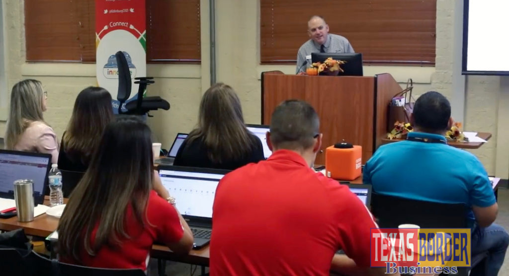 Miguel Guhlin, a Microsoft certified master trainer with the Texas Computer Education Association, demonstrates Microsoft Office 365 apps to administrators during the Edinburg CISD Fall Technology Academy in Edinburg.