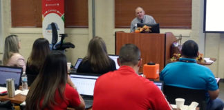 Miguel Guhlin, a Microsoft certified master trainer with the Texas Computer Education Association, demonstrates Microsoft Office 365 apps to administrators during the Edinburg CISD Fall Technology Academy in Edinburg.